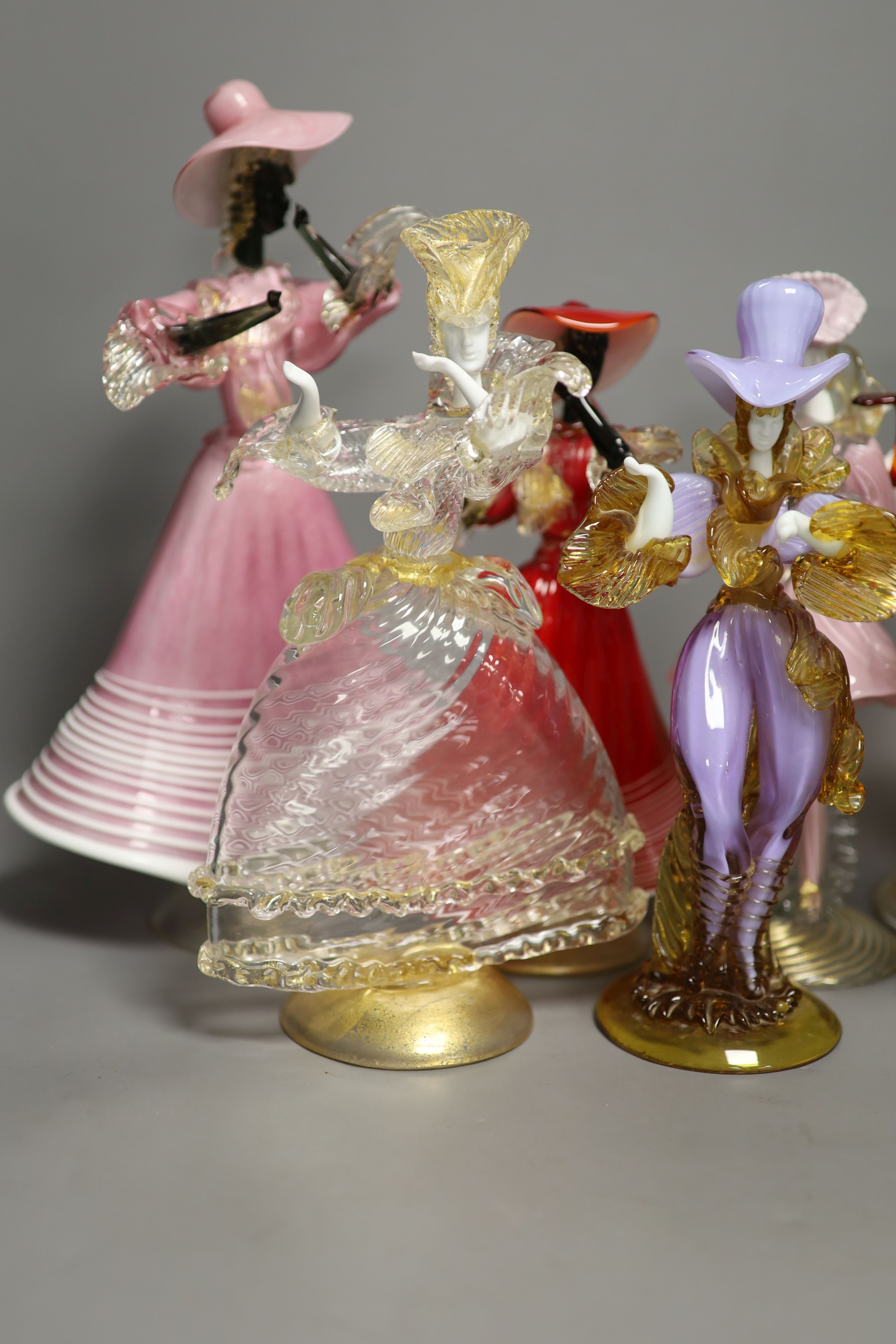 A group of eight Murano glass figures of dancers, tallest 32cm